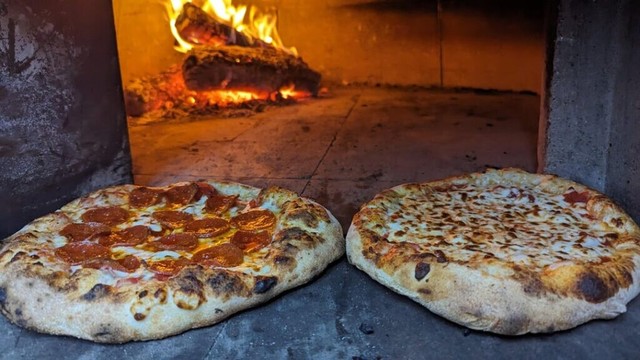 Some of the pizzas coming out of our wood fired pizza food truck