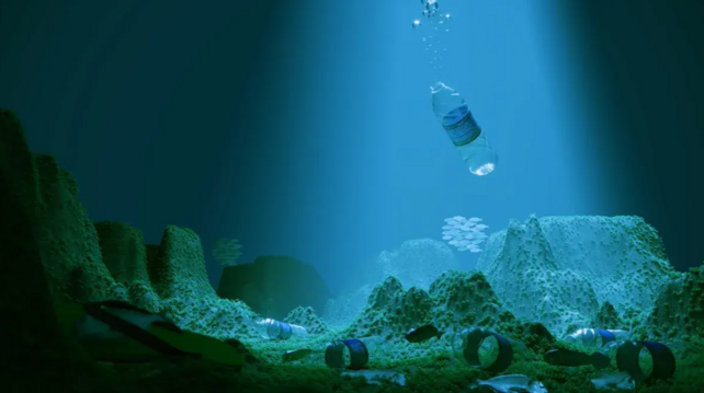 Plastic water bottles lying on ocean bed.