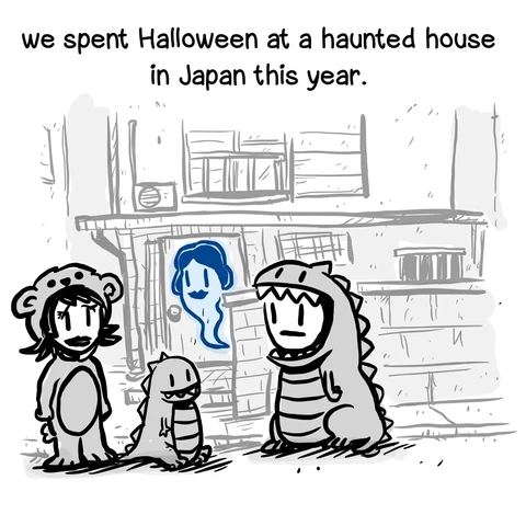 Narrative text: “we spent Halloween at a haunted house
in Japan this year.”
Cartoon image of a man and woman dressed in Halloween costumes along with a young Zilla and a ghost behind them as they stand in front of a house.