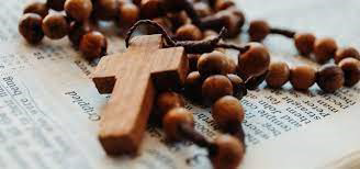 Rosary beads with an empty wooden cross attached