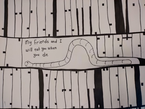 Picture of a worm saying: My friends and I will eat you when you die