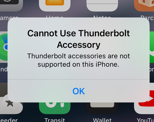 An iOS error:

"Cannot Use Thunderbolt Accessory

Thunderbolt accessories are not supported on this iPhone."