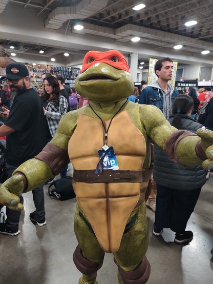 A very well-done cosplay of Michelangelo from the 90s Teenage Mutant Ninja Turtles movies.