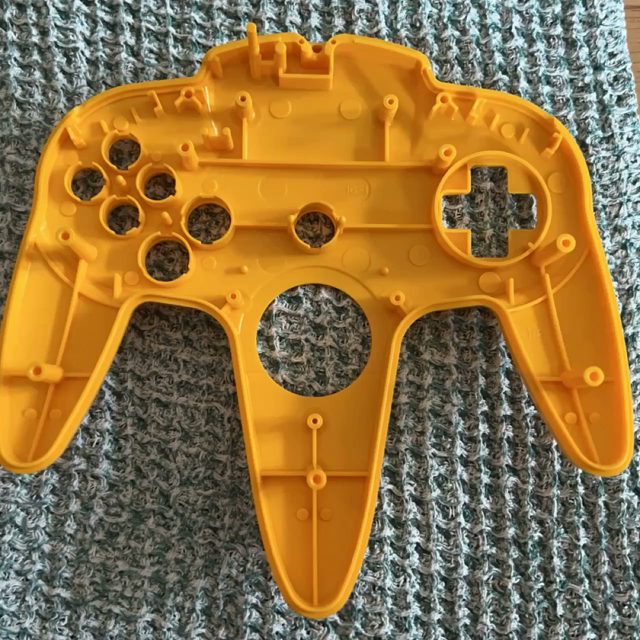 An animation showing my progress assembling the N64 controller kit piece by piece