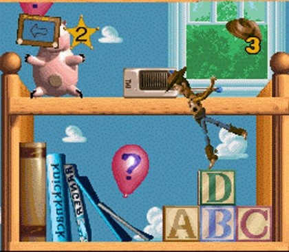 Gameplay of Toy Story. Woody standing tiptoe on a pile of blocks. Hazardous balloons surrounding him. 🎈 Hamm is also there.