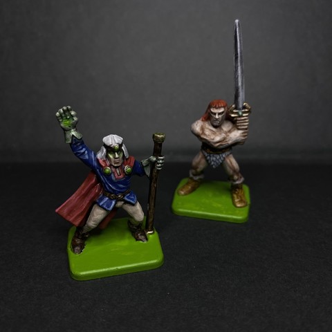 Two Heroquest adventurers together. Classic Barbarian and Wizard.
