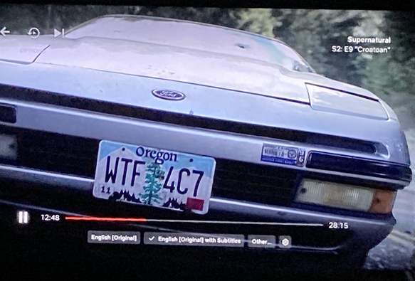 Episode screenshot. Back of a car with an Oregon license plate: WTF 4C7