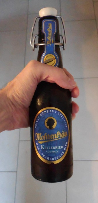 Holding a bottle of beer (Mohrenbräu Kellerbier) in my hands