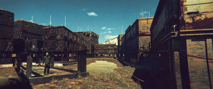 Wide shot, exterior, day -
A small sci-fi town near a river, surrounded by mountains and pine trees.