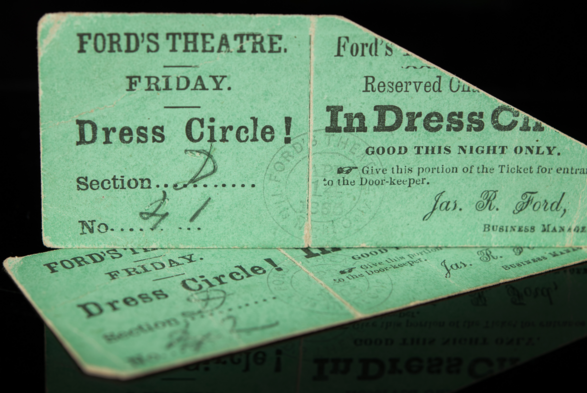 Closeup photo of the two tickets that exceeded auction expectations this past weekend in Boston. Ford's Theatre Dress Circle (the same level as the President and First Lady), the night Lincoln was shot. Pale green with a large part of the corner cut off, by the "Door-keeper". The Section and seat number are handwritten.