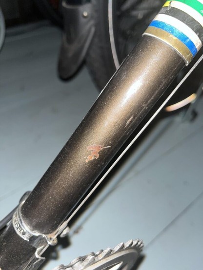 What to do about rust spots on old steel frame?