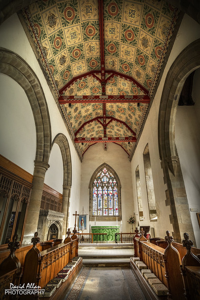 The interior chancel of St Peter's Church with its beautiful barrel-shaped ceiling.