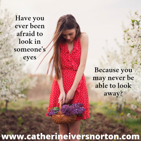 A pretty young woman holding a basket of flowers looks down. The caption reads, "Have you ever been afraid to look in someone's eyes because you may never be able to look away?"
