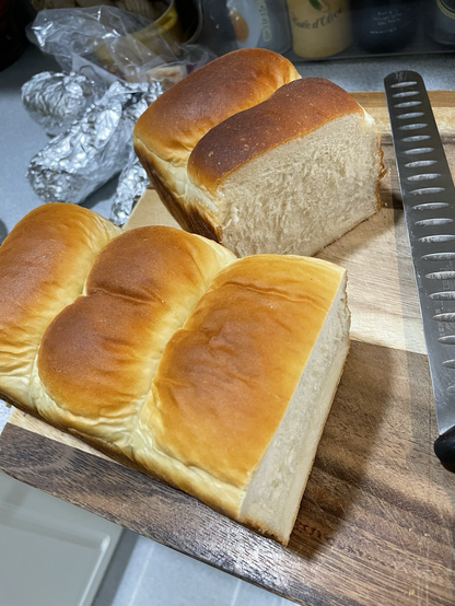 Two loaves of freshly made Japanese style bread - Al: shokupan