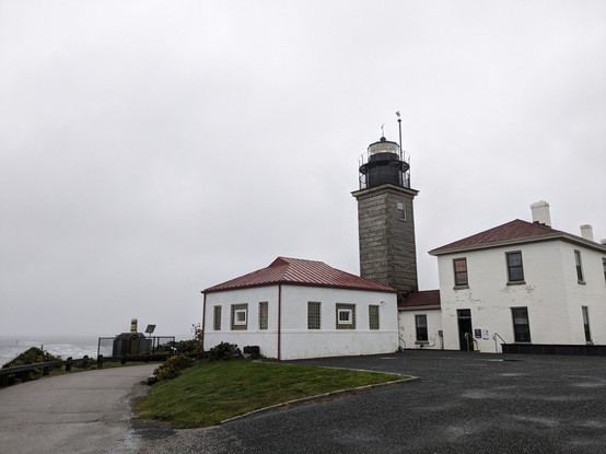 Lighthouse in the Rhode Island coast in rainy weather.