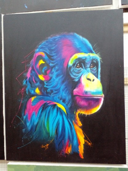 painting of a monkey against black background done in bright colors with a lot of dark tones