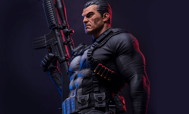 close-up of torso and face of the Punisher, he is wearing bandoliers and tactical stuff