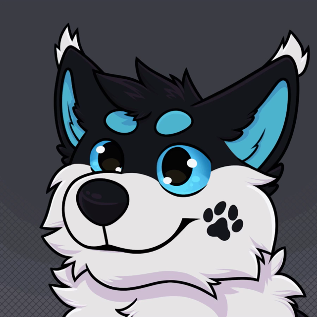 A gif of a black, blue, and white canine. They have a happy expression. The first frame has their mouth closed, and the second frame has it open.