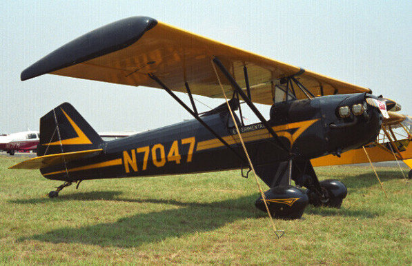 An airplane: Corben  Baby Ace taken during EAA Southwest Fly-In, New Braunfels, TX, 16/17-05-2003