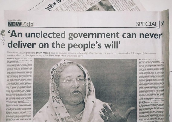 A shot of a newspaper called "NewAge". In which the title says " The unelected Govt can never deliver on the people's will - Sheikh Hasia".