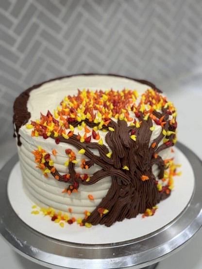 I made this cute fall cake! It’s chocolate cake, coconut pastry cream, chocolate ganache and coconut buttercream