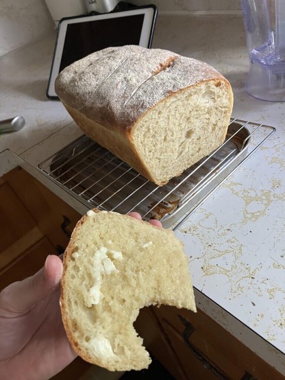 I know I’m supposed to let it cool completely before cutting it open, but I couldn’t resist some fresh, warm, buttered bread!