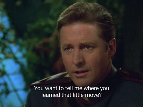 Close-up of Captain Sheridan, dressed in his EarthForce uniform.

The caption reads: "You want to tell me where you learned that little move?"