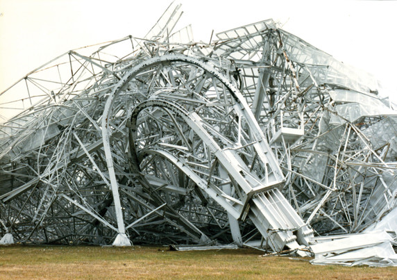 On the night of November 15, 1988, the 300-foot telescope in Green Bank, West Virginia collapsed. The extent of the damage was not known until the Sun rose on the scene. This photo shows the incredible ruin of folded steel that greeted the staff in the morning.
Credit: NRAO/AUI/NSF