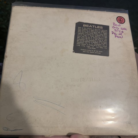 A beat up copy of The Beatles self titled album