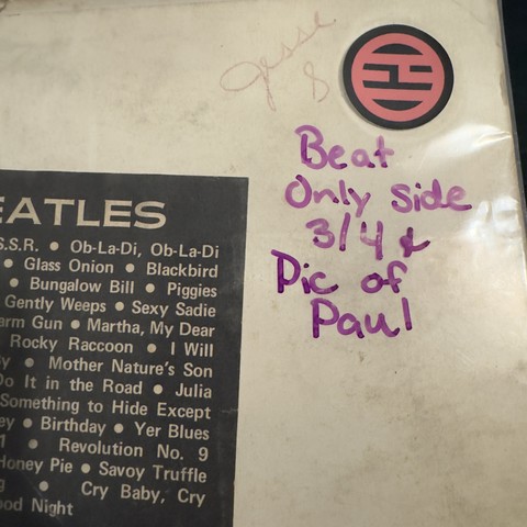 A close up of a description saying “Beat. Only Side 3/4 & Pic of Paul”
