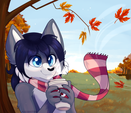 A feline furry with a cup of coffee enjoying fall