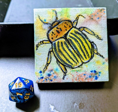 Small painting of a yellow and black striped Colorado potato beetle, with d20 for scale.
