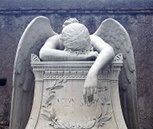 event sponsorship psychology: photograph of a sculpture of an exhausted angel resting on a plinth
