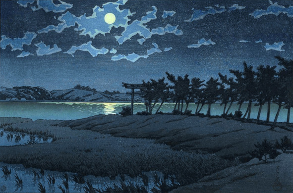 A full moon rises over Lake Hinuma, northeast of Tokyo. Trees line up along the grassy shoreline; taller grasses grow in the water along the edge of the lake, giving the area a marshy look. Across the lake, low rolling hills are dotted with trees. Above, the bright moon dominates the starless night sky, silvering a few tattered clouds; the still surface of the lake reflects and scatters the light of the moon. A torii gate stands at the center of the image, near the trees along the shore.