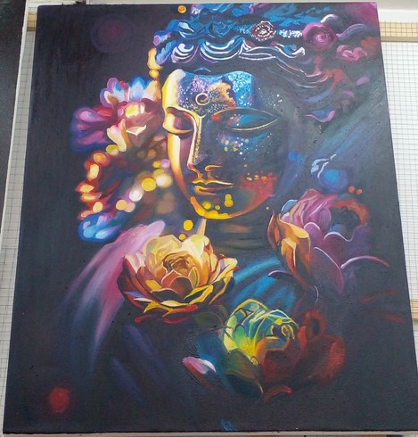 painting of the Buddha surrounded by flowers