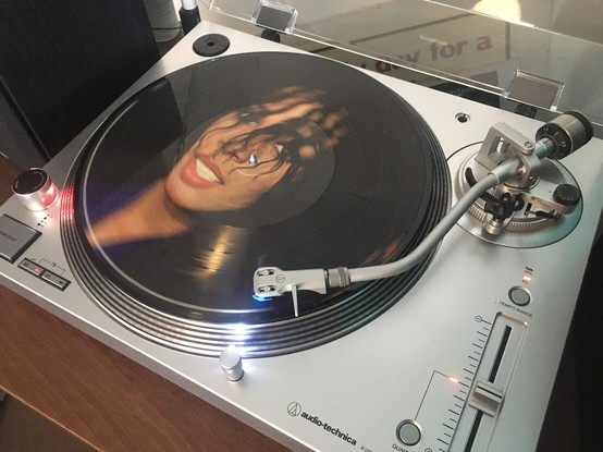 The Donna Summer self-titled LP on picture disc vinyl, playing on an Audio Technica LP120 turntable
