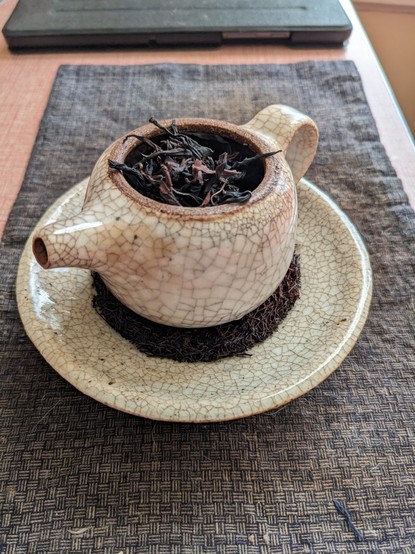 A pot full of black tea.