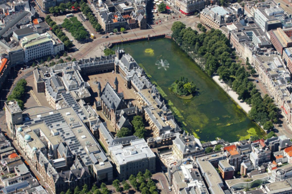 aerial photo of the building, showing the city around it
