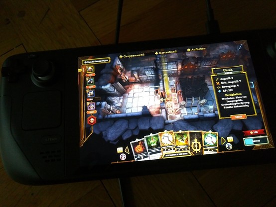 The photos show screenshots of the game Demeo on a SteamDeck