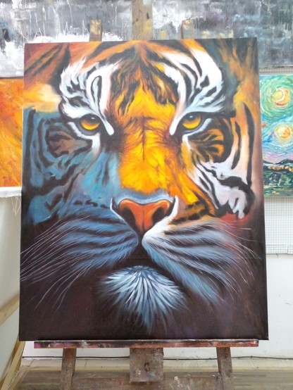 painting of the face of a tiger on a dark background,  the tiger's face is very close to the viewer
