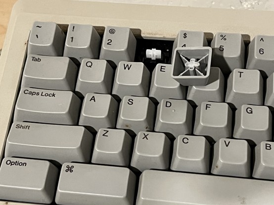 Apple Macintosh Plus keyboard with broken 3 key