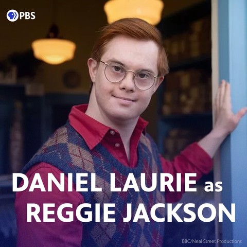 Photo of a man with red hair and glasses wearing a red shirt and a diamond patterned sleeveless sweater. He is looking into the camera.
Upper-left is the PBS logo and the letters “PBS".
Overlay text along the bottom reads "DANIEL LAURIE as REGGIE JACKSON”