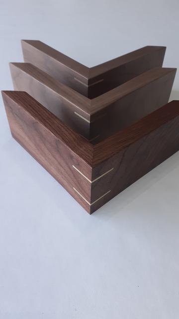 Three walnut corner samples with splines