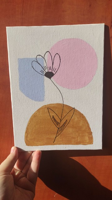 Simple, I think boho style paiting, with pastell colored shapes and a little flower drawn on top for the center piece!