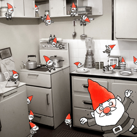 Red capped elves taking over a kitchen