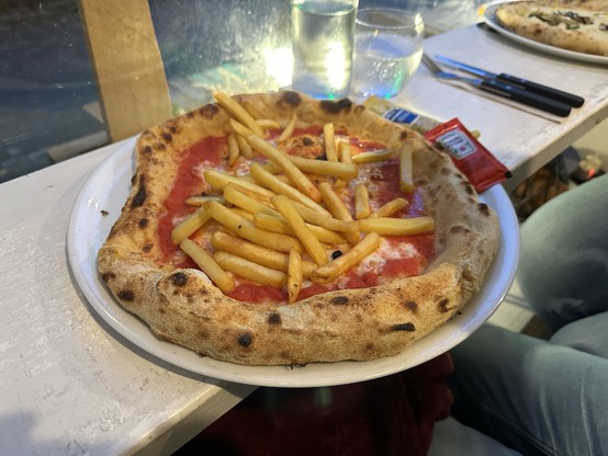Sicilian pizza with French fries. Mayonnaise and Ketchup included.
