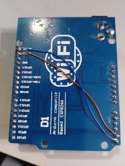 Wemos D1 ESP8266 back side of the board, where I soldiered to wires to connect D14 and D15 to where A4 and A5 should be. The confusing this is, the board even says it's Arduino Compatile....which really is only partially true. I've soldier better before, but working with small wire, and soldier that was hard to get heated up is, it's not as pretty as I would have liked, but it does work. Now I2C is in the spot most Arduino Uno shields expect.