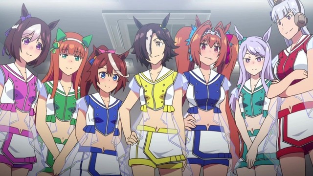 Photo of the main cast of Uma Musume - seven horse girls, posing for the camera in their idol outfits.