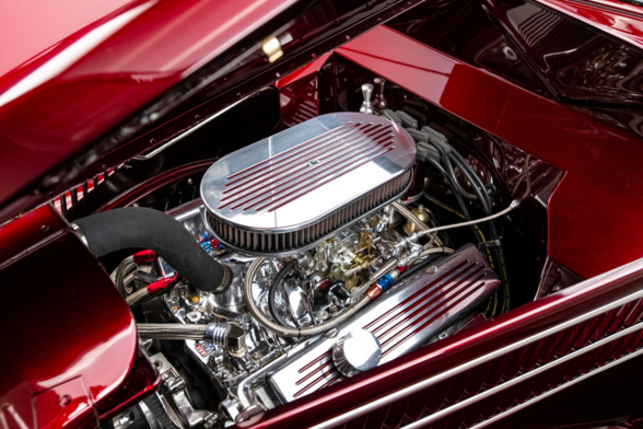 the engine of the vehicle, it is silver chrome and shiny