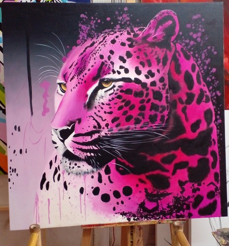 a painting of a pink leopard, looking to the right, its black spots look intense next to the hot pink color, there are paint splatter and drip effects on it